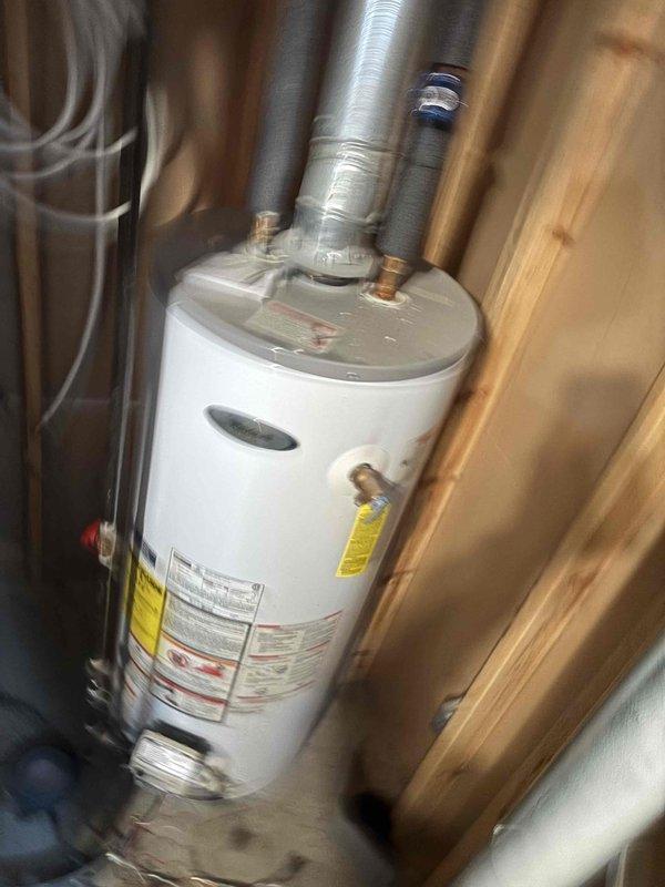 Diagnosed and repaired Whirlpool water heater (approximately 7 years old) that was not producing hot water due to ignition failure. Successfully restored proper ignition and verified normal operation, ensuring adequate hot water supply for customer.