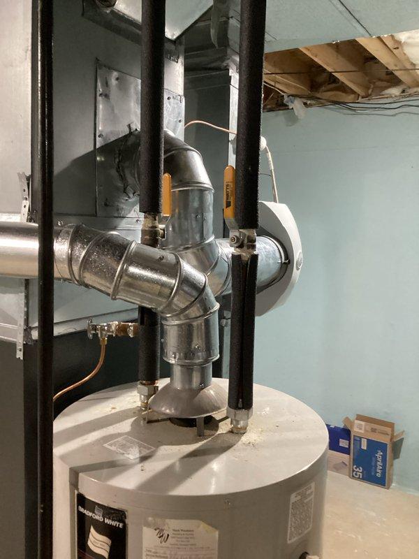 Responded to water leak service call for 23-year-old water heater. Upon inspection, identified active leak from tank, indicating end of useful life. Recommended replacement as repair not feasible due to age and condition of unit.