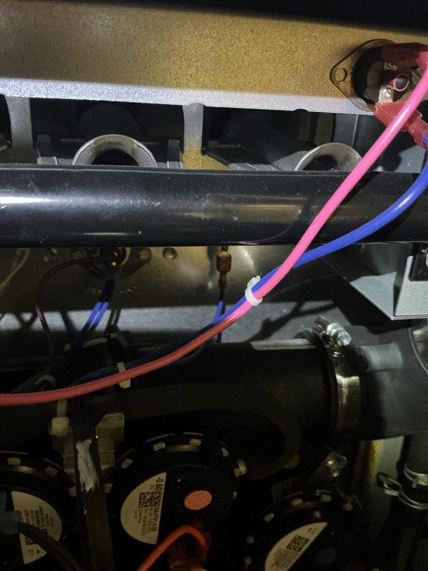Responded to no heat call for 2-year-old EnergiAir model WT 02-2034 under warranty. Inspection revealed electrical connection issues at the inducer motor assembly. Repaired loose wiring connections and verified proper system operation before completing service.