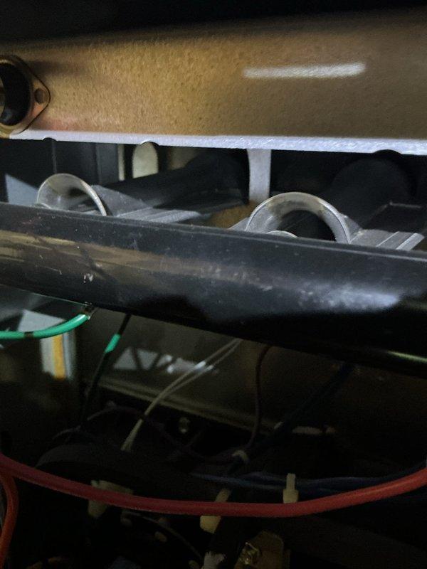 Responded to no heat call for 2-year-old EnergiAir model WT 02-2034 under warranty. Inspection revealed electrical connection issues at the inducer motor assembly. Repaired loose wiring connections and verified proper system operation before completing service.