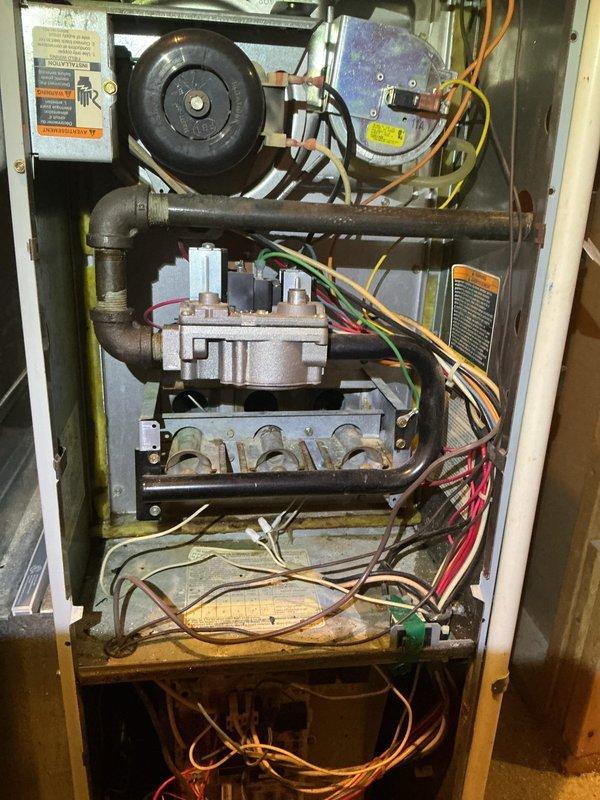 Diagnosed and repaired 1996 Carrier furnace that was cycling off after initial startup. Inspection revealed faulty control board connections causing intermittent operation. Cleaned electrical contacts and secured loose wiring at the control panel, restoring proper heat function.