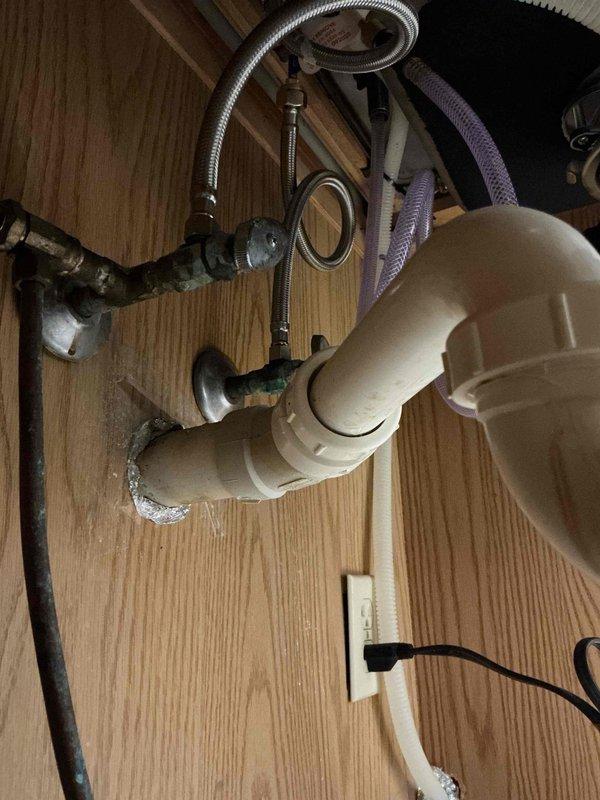 Completed customer-supplied center-set faucet installation in kitchen sink. Installed new supply lines and ensured proper drainage connections to existing PVC system under cabinet. All connections tested with no leaks observed.