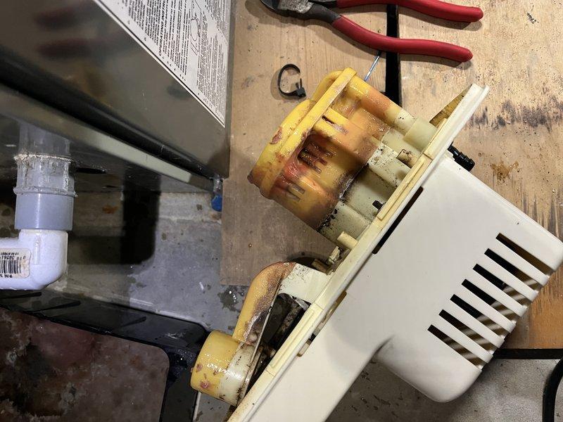 Diagnosed and serviced a noisy Trane humidifier connected to furnace system. Disassembled unit to inspect internal components, finding accumulated mineral deposits and wear on the fan assembly causing operational noise. Cleaned and reassembled the humidifier, restoring proper quiet operation.