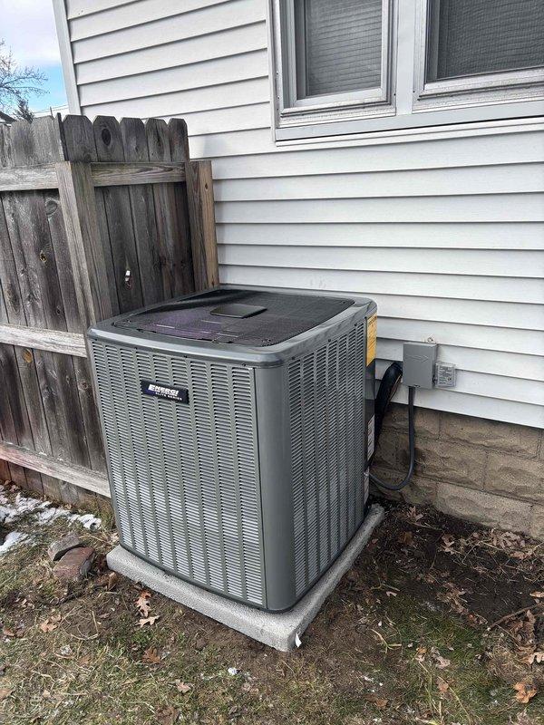 Successfully installed new American Standard HVAC system including indoor air handler unit with complete ductwork integration and PVC condensate drainage. Outdoor condenser unit was properly placed on concrete pad with electrical connections established according to manufacturer specifications.
