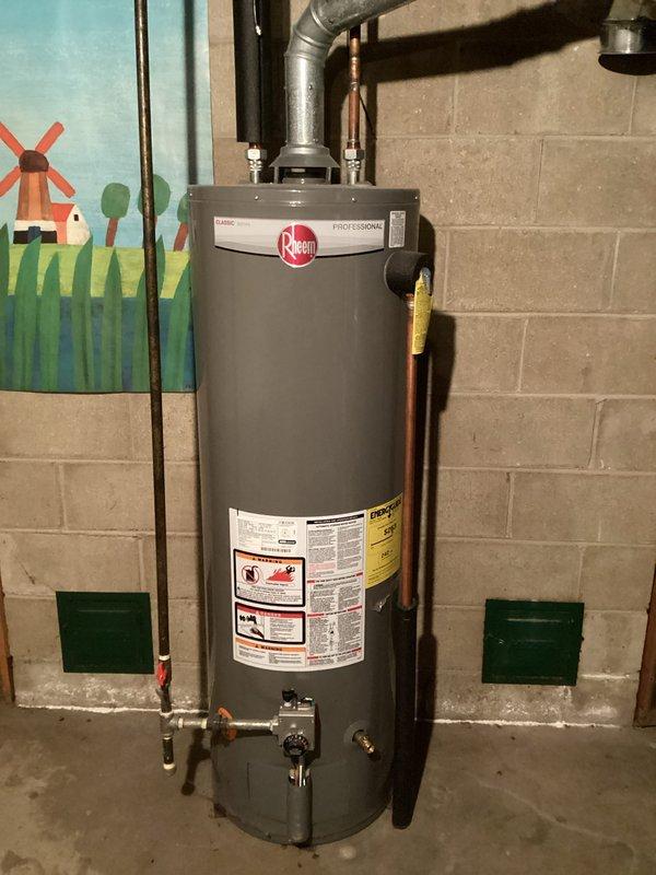 Performed annual heating maintenance on a 2-year-old EnergiAir furnace (model WT 03-2034). System inspection revealed no operational issues. Documented Rheem Professional water heater and complete HVAC system with proper ventilation connections. All components functioning within normal parameters.