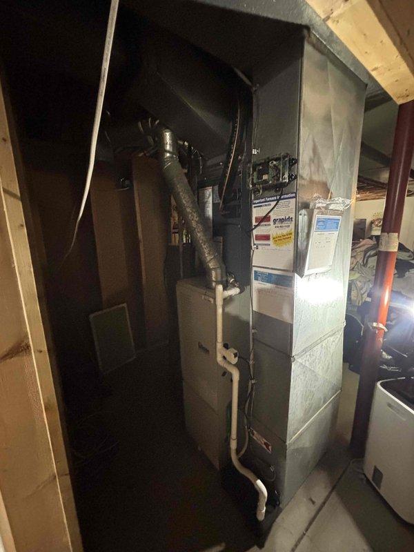 Successfully completed full replacement of residential HVAC system, installing new furnace in utility area with proper ductwork, exhaust venting, and drainage connections. Exterior AC unit was positioned on concrete pad with appropriate electrical and refrigerant line connections, and system was tested to ensure proper operation.