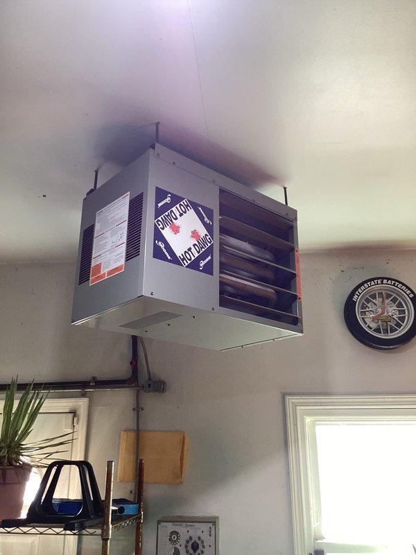 Diagnosed excessive noise from 15-year-old Modine Hot Dog garage heater. Inspection revealed worn fan bearings causing operational noise. Replaced fan assembly and lubricated moving components to eliminate noise and restore proper functionality.