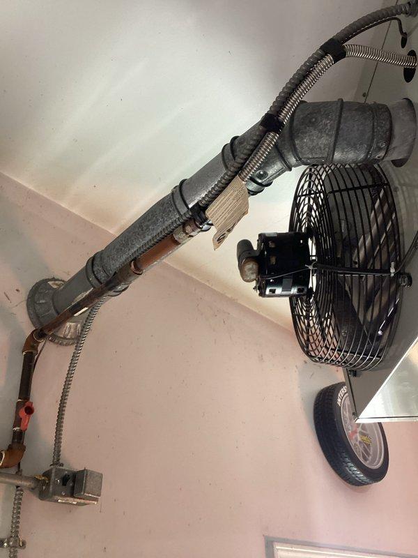 Diagnosed excessive noise from 15-year-old Modine Hot Dog garage heater. Inspection revealed worn fan bearings causing operational noise. Replaced fan assembly and lubricated moving components to eliminate noise and restore proper functionality.