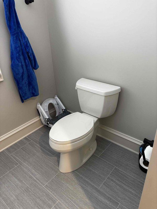 Diagnosed garbage disposal making unusual noises and found debris causing obstruction. Removed foreign objects, tested operation, and verified proper functioning. Also inspected instant hot water spout and multiple toilets requiring repair, documenting issues with photographs for comprehensive assessment.