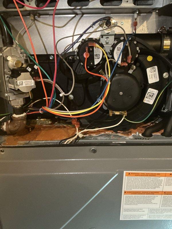 Performed annual maintenance on 7-year-old EnergiAir furnace. Inspected electrical connections and wiring, noting proper connection integrity at terminal blocks. Examined blower motor assembly and gas valve operation, with all components functioning normally. No issues identified with the heating system during this routine tune-up service.