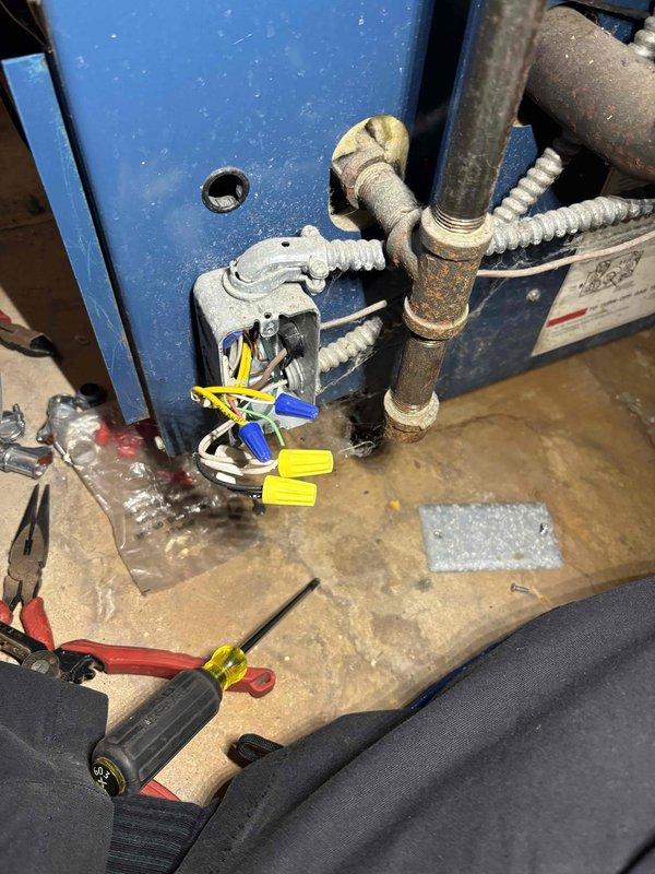 Returned to service Duratex boiler system showing 96% efficiency reading. Performed previously quoted repairs, including replacement of corroded copper piping and electrical connections. System is now operational with all components properly secured and tested.