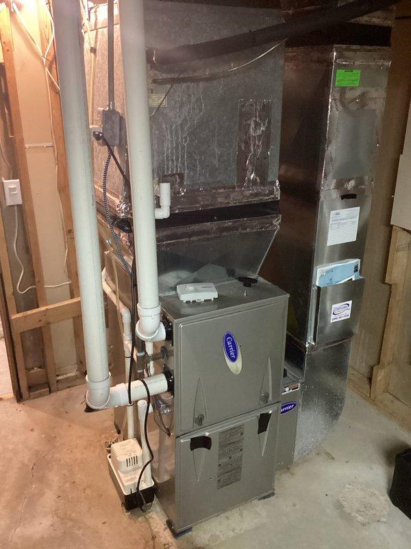 Diagnosed intermittent heating issue on 10-year-old Carrier furnace that was cycling off prematurely and not reaching set temperature. Inspection revealed flame sensor contamination causing improper flame detection and system shutdown. Cleaned flame sensor, verified proper ignition sequence, and confirmed system now maintains temperature without premature cycling. Recommended annual maintenance to prevent recurrence.