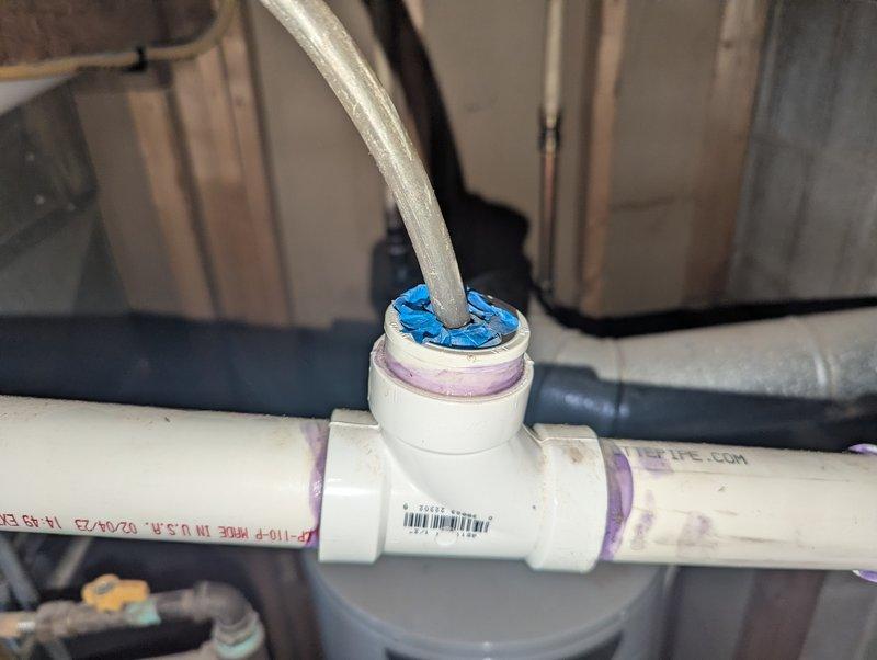 Diagnosed and repaired YORK humidifier that was installed one month ago but not functioning. Discovered improper PVC connections with visible discoloration and debris accumulation at pipe fittings. Corrected installation by properly sealing connections with appropriate plumber's tape and ensuring proper water supply to the humidification system.