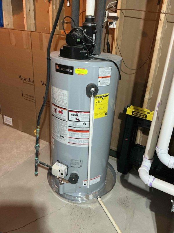 Performed scheduled water heater tune-up and flush on a Lochinmar tanked water heater located in utility room. Service included thorough system inspection, sediment removal, and verification of proper operation of safety controls and valves. Unit is functioning within normal parameters with no issues identified.