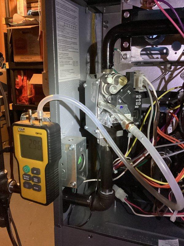 Performed complimentary annual tune-up on EnergiAir WT 08-2035 furnace (less than 1 year old). Conducted diagnostic testing with UEi device showing reading of 226. System functioning properly with all components in good working condition.