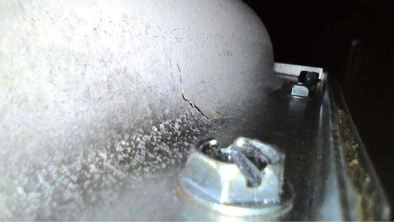 Performed annual heating tune-up on 10-year-old furnace and humidifier. Discovered significant crack in metal component and deteriorating insulation material that requires immediate attention. Documented issues with photos and recommended replacement of damaged parts to prevent system failure.