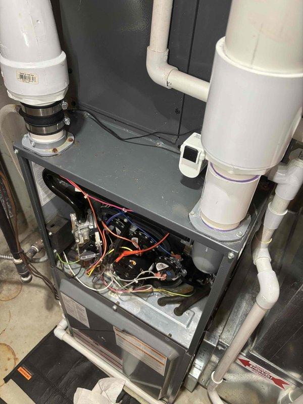Performed annual furnace and humidifier tune-up on 7-year-old ENE WT system. Inspected internal components including circuit boards, wiring, and ventilation system. Noted significant dust accumulation in the air channel requiring cleaning, with proper airflow restored upon completion.