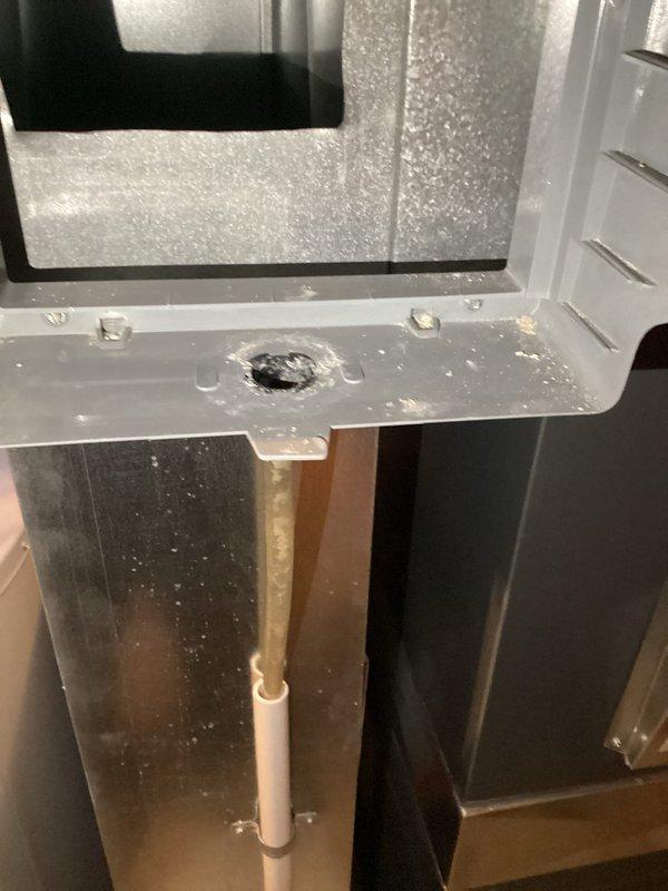 Performed furnace and humidifier tune-up as part of annual heating service. Inspected condensate drain system and noted proper drainage with some moisture present. Replaced air filter with new MicroPower Guard filter as requested by customer.