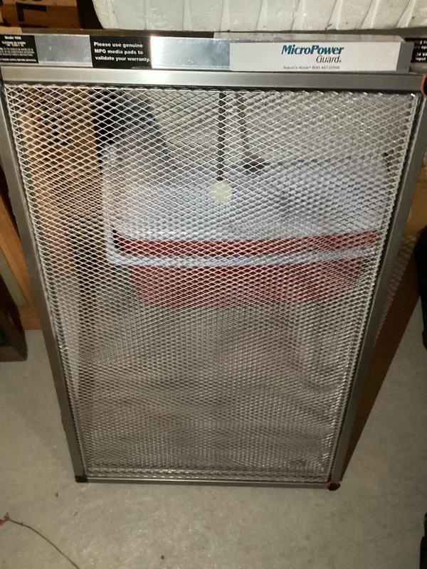 Performed furnace and humidifier tune-up as part of annual heating service. Inspected condensate drain system and noted proper drainage with some moisture present. Replaced air filter with new MicroPower Guard filter as requested by customer.