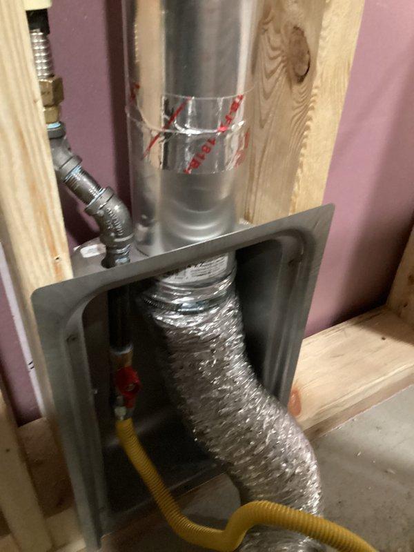 Installed nail plates to protect plumbing lines and properly supported piping in wall bays. Upgraded to larger laundry box and hard-piped gas line connection to laundry box per code requirements. All work completed in coordination with other trades to ensure proper installation within framed wall cavity.