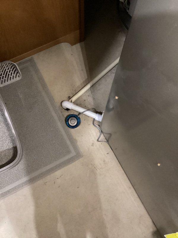 Returned to complete humidifier service call to replace faulty water sensor and retrieve previously left tools. Accessed under-sink plumbing area, successfully installed new sensor on humidifier unit and verified proper operation.