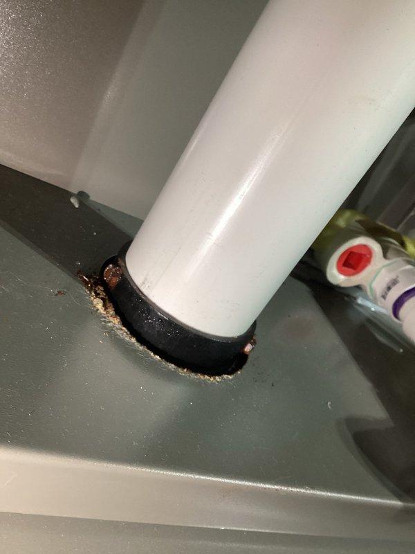 Performed annual heating service on a 3-year-old Lennox system. Observed corrosion at the condensate drain connection with visible rust deposits around the rubber gasket. Completed standard furnace tune-up; system is now operating within normal parameters.