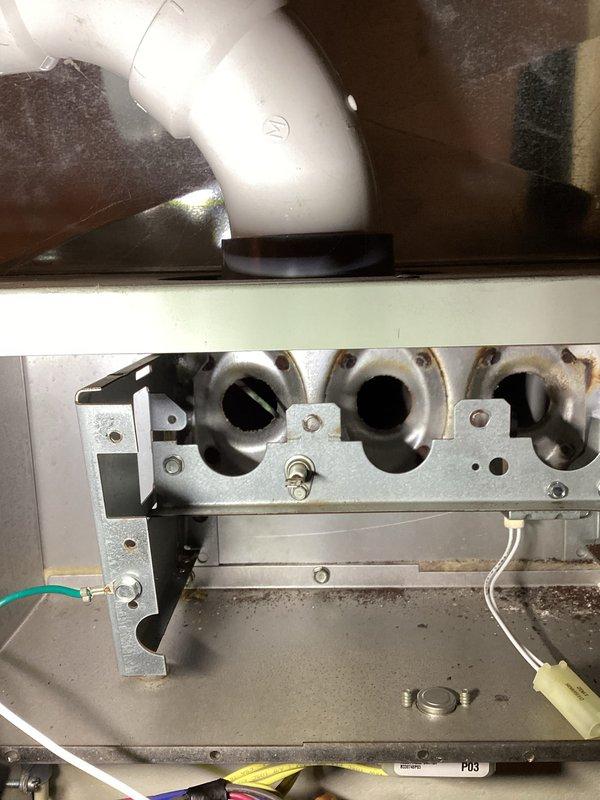 Performed annual tune-up on 11-year-old Trane XV95 furnace. Noted significant mineral buildup and discoloration in the condensate pump system requiring cleaning. Inspected ventilation components and electrical connections; all functional with normal operational wear.