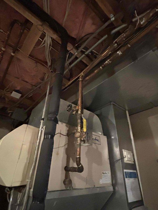 Returned to property to complete rewiring of two basement air handlers as previously quoted. Inspected and reconnected control wiring at both units, ensuring proper connections with wire nuts and verifying all terminations. Tested system operation after rewiring to confirm proper functionality of both air handlers.