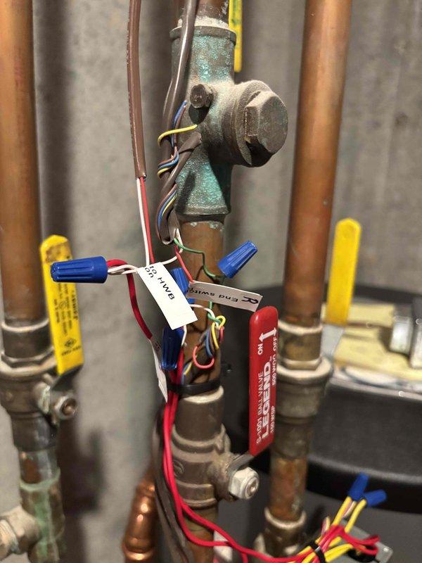 Returned to property to complete rewiring of two basement air handlers as previously quoted. Inspected and reconnected control wiring at both units, ensuring proper connections with wire nuts and verifying all terminations. Tested system operation after rewiring to confirm proper functionality of both air handlers.