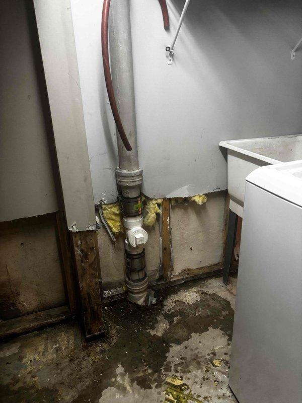 Successfully installed a 3" clean out and performed drain cleaning on 3" plumbing system in a confined wall space with exposed framing. Accessed and serviced pipes within the utility area that showed previous moisture issues, completing the quoted repair work as specified.