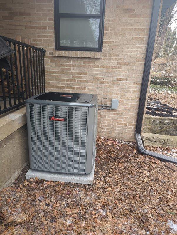 Successfully completed installation of Amana air conditioning system, including outdoor condensing unit mounted on concrete pad and new furnace with properly connected ductwork in utility area. System was fully tested and payment was collected upon completion.