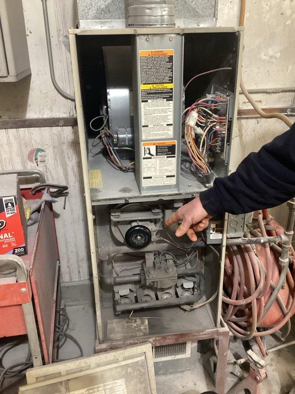 Diagnosed 30-year-old garage heater that failed shortly after recent electric board replacement. Inspection of the MAXX ceiling-mounted unit revealed electrical connection issues at the control panel that were preventing proper heating function. Repaired faulty wiring connections and verified system operation with successful heat cycle test.