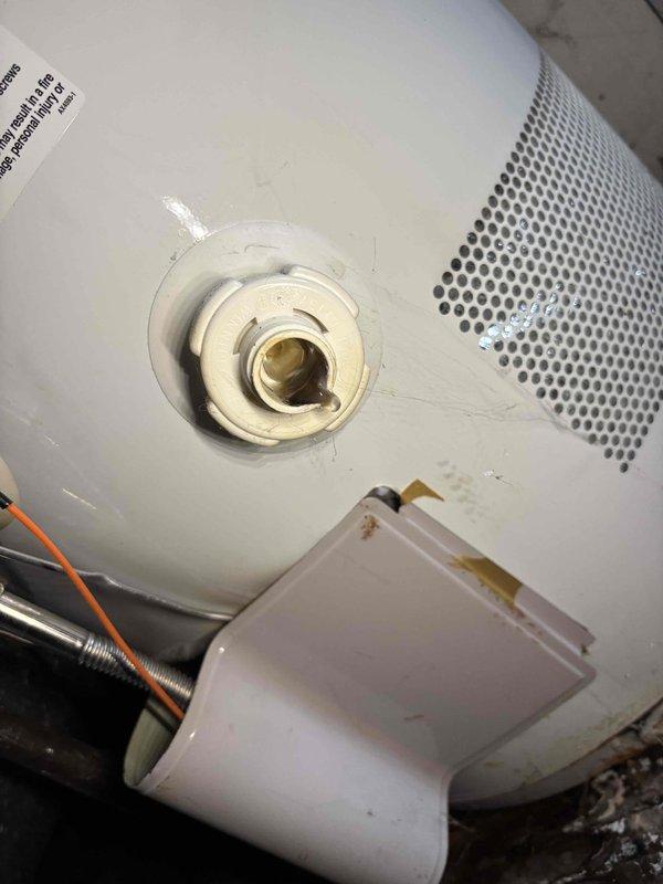 Responded to no-heat call for horizontal attic furnace approximately 20+ years old. Diagnosed ignition failure despite functioning blower. Inspection revealed significant heat exchanger deterioration and cracking, rendering unit unsafe for operation. System was red-tagged and customer advised of need for complete furnace replacement due to safety concerns.