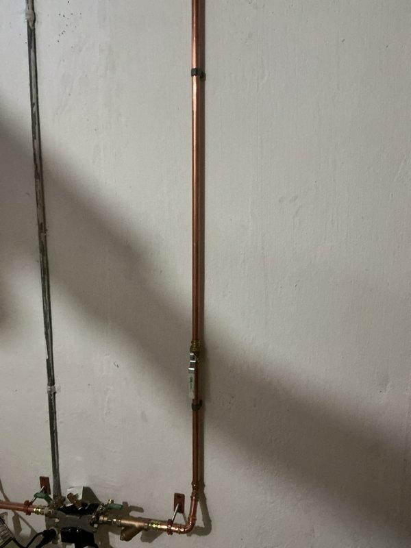 Responded to QUOTR-Quoted Repair for sump and water backup issue. Installed new sump pump system with PVC drainage configuration and verified proper operation of the pump. Additionally, serviced and inspected copper water supply lines, replacing worn fittings and securing all plumbing to wall mounts to ensure code compliance and prevent future water backup concerns.