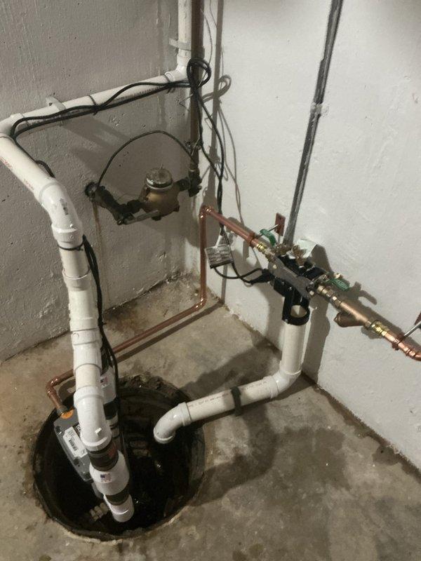 Responded to QUOTR-Quoted Repair for sump and water backup issue. Installed new sump pump system with PVC drainage configuration and verified proper operation of the pump. Additionally, serviced and inspected copper water supply lines, replacing worn fittings and securing all plumbing to wall mounts to ensure code compliance and prevent future water backup concerns.