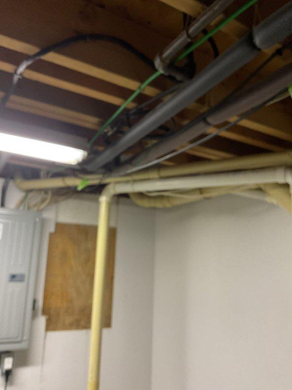 Repaired outdoor faucet leak by replacing deteriorated valve stem assembly and inspecting connected PVC supply lines in basement for secondary damage. Verified proper function after repair with no water hammer or residual leakage, and confirmed no frost damage to interior piping components.