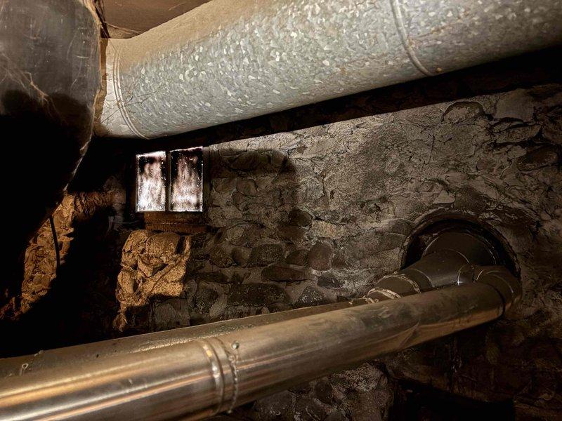 Responded to no heat complaint on 20+ year old furnace that began making buzzing sounds after customer changed filter. Upon inspection of the unit located in basement, diagnosed ignition failure issue. Repaired faulty ignition system components and verified proper operation before completing service.