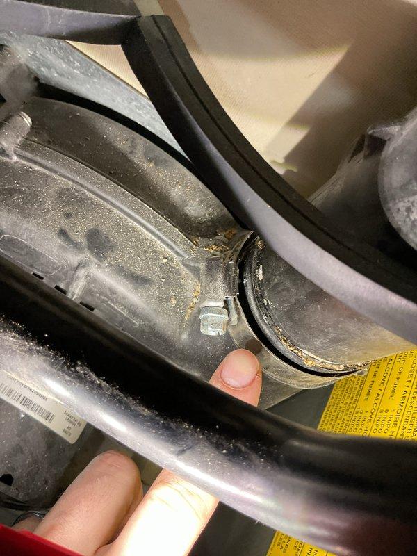 Performed annual heating maintenance on 11-year-old Trane furnace and humidifier. Documented existing corrosion and dust accumulation in system components. Identified loose connection clip requiring attention during inspection.