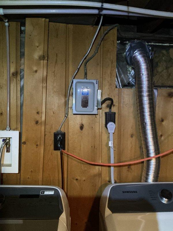 Responded to a service call for two non-functioning outlets after customer plugged in a space heater. Upon inspection of the electrical panel in the basement utility area, identified a tripped circuit breaker. Reset the breaker and tested both outlets, confirming full restoration of power. Advised customer to distribute high-wattage appliances across different circuits to prevent future overloads.