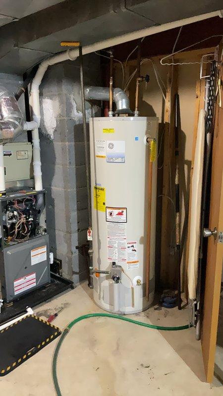 Completed annual heating tune-up on 8-year-old furnace with humidifier. Noted water heater with galvanized vent pipe and provided customer with estimate for replacement as requested. All systems functioning properly with no issues identified.