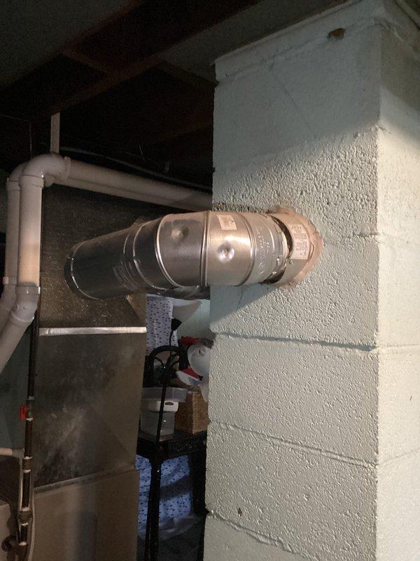 Responded to no hot water complaint for 11-year-old Richmond water heater. Inspected ventilation system and found improper flue pipe installation causing draft issues. Repaired and realigned flue connection, restored proper venting, and confirmed water heater returned to normal operation with adequate hot water production.