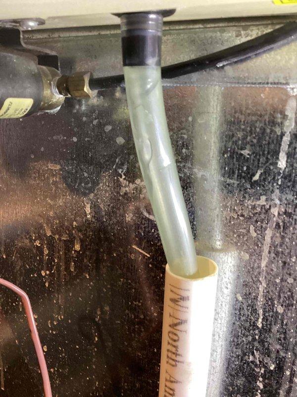 Responded to service call for 16-year-old Aprilaire humidifier that was not functioning. Inspection revealed significant mineral buildup on internal components and deteriorated wiring connections. Performed thorough cleaning of feed tube and water panel, replaced damaged wire connections with proper wire nuts, and restored system to normal operation.