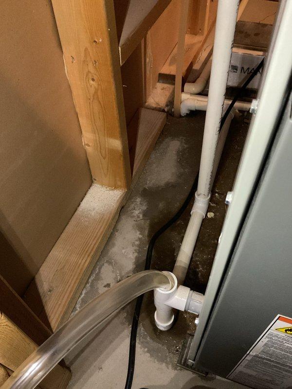 Performed comprehensive annual heating system inspection on 10-year-old furnace as part of scheduled maintenance under comfort club membership. Inspected furnace components and drainage systems in utility area, with particular attention to condensate line and connections. System is functioning properly with no immediate concerns identified; customer's comfort club membership remains active through 2025.