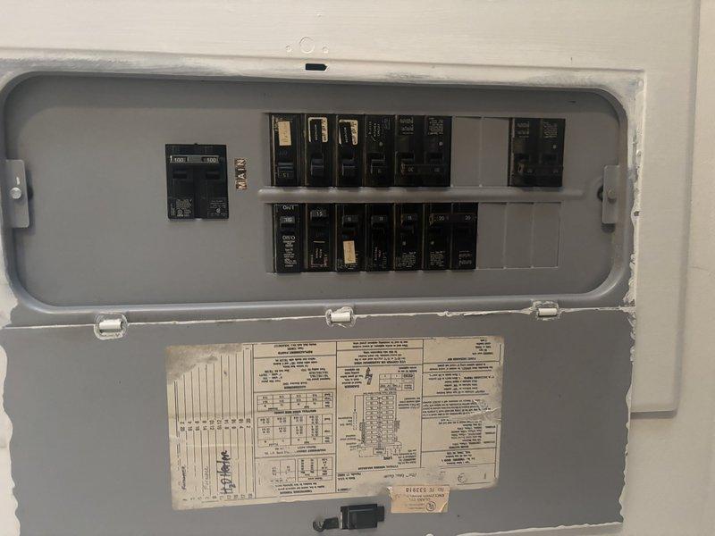 Inspected 20-year-old water heater reported to periodically fail to heat water adequately. Found tripped breaker in electrical panel which was reset; system operation was restored. Advised client that given the unit's age and intermittent heating issues, replacement would be recommended rather than continued repairs.