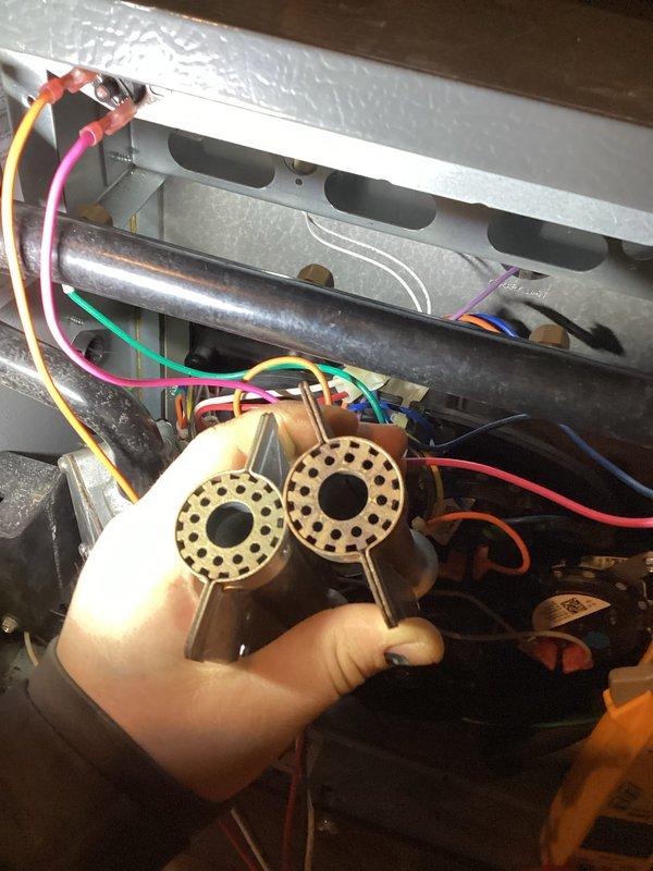 Performed annual heating tune-up on 8-year-old Energi WT furnace with warranty through 01/2028. Inspected and cleaned condensate pump which showed signs of discoloration and moisture accumulation in the collection pan, and examined electrical components including circular contacts with multiple wire connections to ensure proper operation.