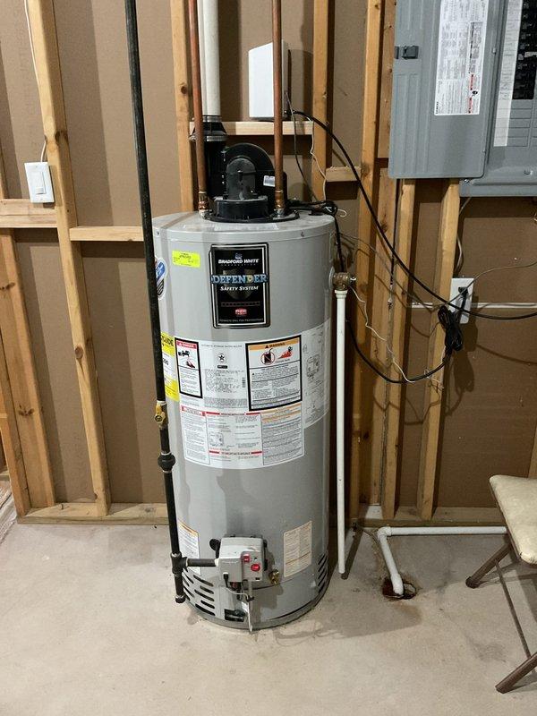 Performed diagnostic inspection on kitchen drain system due to reported gurgling when dishwasher runs. Identified and cleared minor obstruction in drain line that was causing air displacement and gurgling noise. Additionally, conducted preventative maintenance on sump pump system that was cycling frequently and performed standard water heater tune-up service, including temperature check, pressure relief valve test, and inspection of connections.