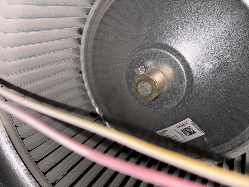 Responded to home with post-fire restoration concerns regarding HVAC system making vibration noise, loud bangs during cycling, and insufficient heating. Inspected blower wheel assembly and found foreign debris adhered to wheel causing imbalance. Removed debris, tested system operation, and verified proper temperature rise and quiet operation after service.