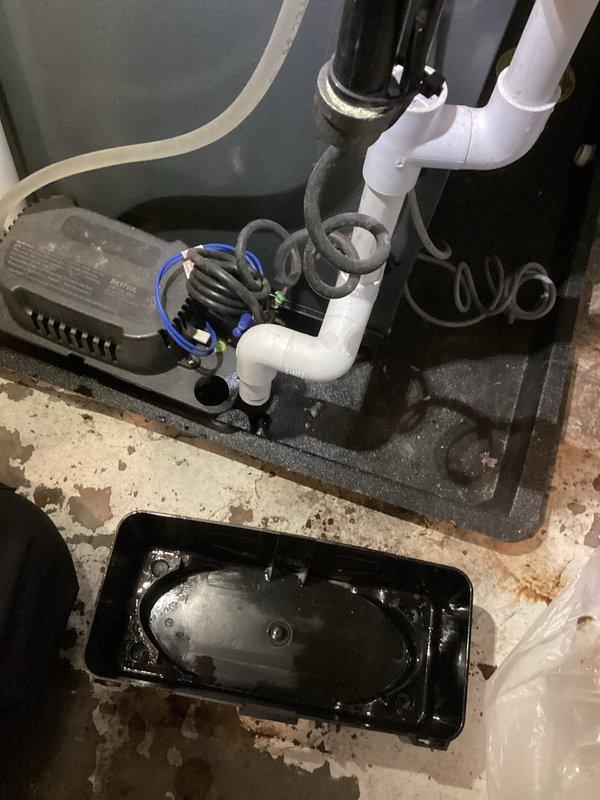 Completed annual inspection on 1-2 year old EnergiAir furnace. Inspected condensate pump system in basement, noting proper operation with no issues. Documented installation with photos showing the drainage system and containment tray functioning as designed. System is in good working order with warranty valid until 2027.