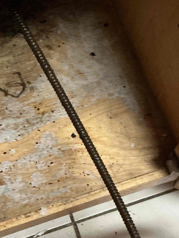 Cleared kitchen sink drain blockage at U-joint, removing accumulated debris and restoring proper drainage. Inspected upstairs bathroom faucet drip issue, diagnosed worn cartridge requiring replacement to eliminate leakage.