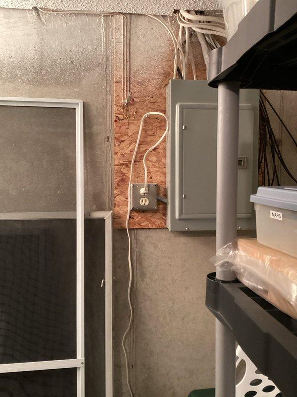 Conducted site visit for water softener estimate; documented existing utility room setup including Lennox furnace system and electrical panel configuration. Left voicemail with customer; test results and pricing information to be provided by sales representative.